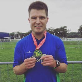 richard with his medal.jpg