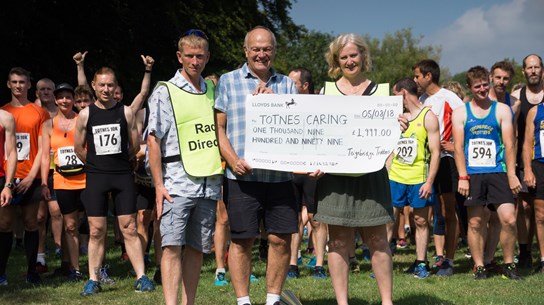 totnes caring cheque donation.jpg