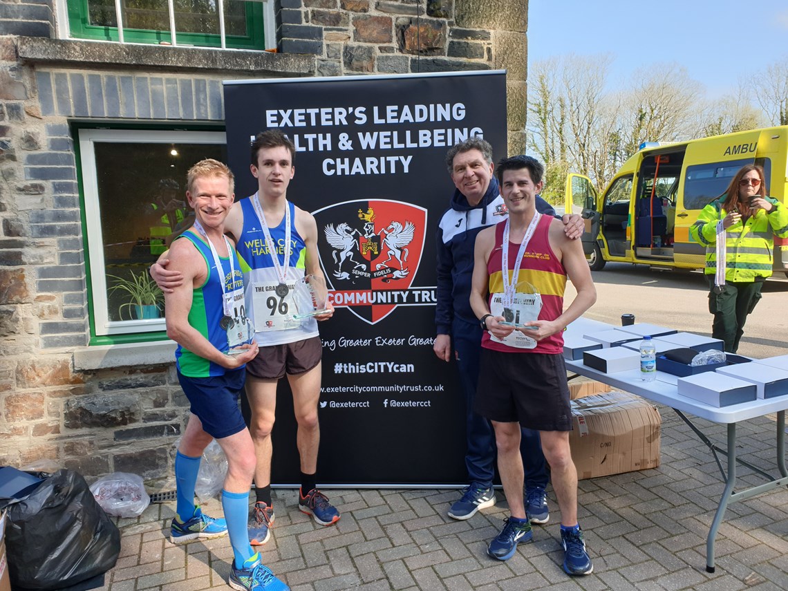 first three finishers in granite way 10 miler.jpg