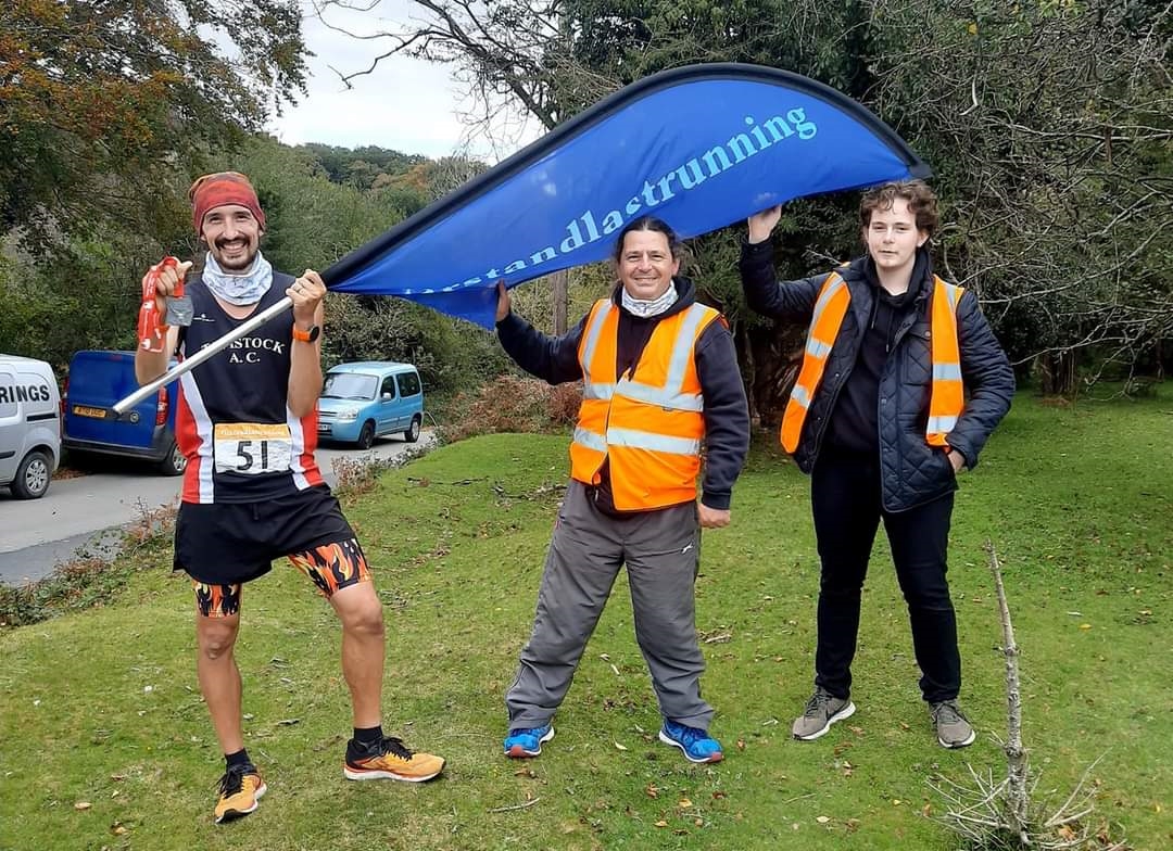 adam holland celebrates his 2nd best course time with rd davey green.jpg