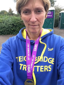 sue with her medal.jpg