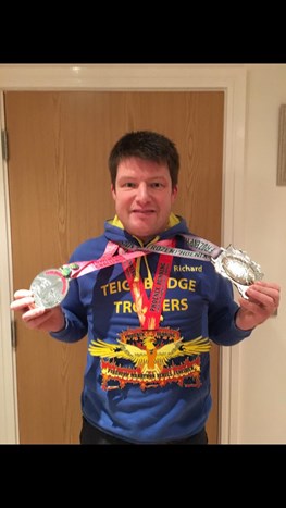 richard with his medals.jpg