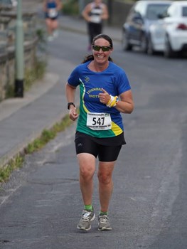 lucy evans all smiles at ashburton 10k.jpg