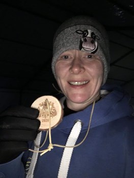 suzi mills with her hard earned medal after the beyond the far side.jpg