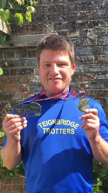 richard with his medals.jpg