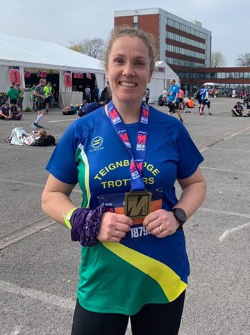 emma ray looking pleased after smashing pb in manchester marathon.jpg