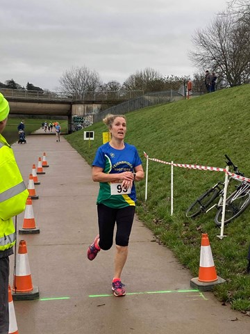emma ray crosses the line at exeter 5 race.jpeg