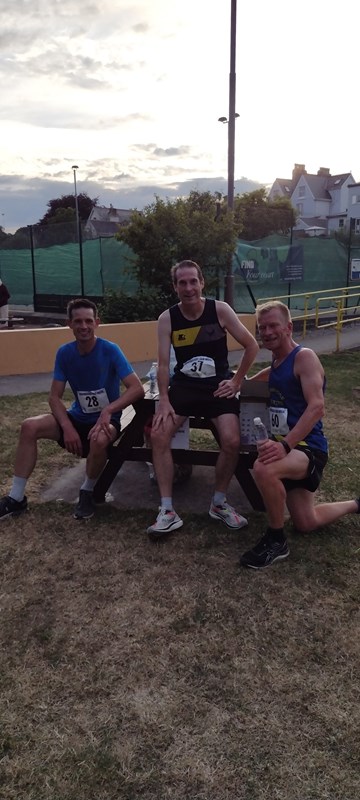 podium finishers at dartmouth regatta 5 mile road race.jpg