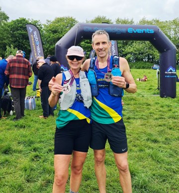 rachel and matt steele_race the tide_medal_cropped.png
