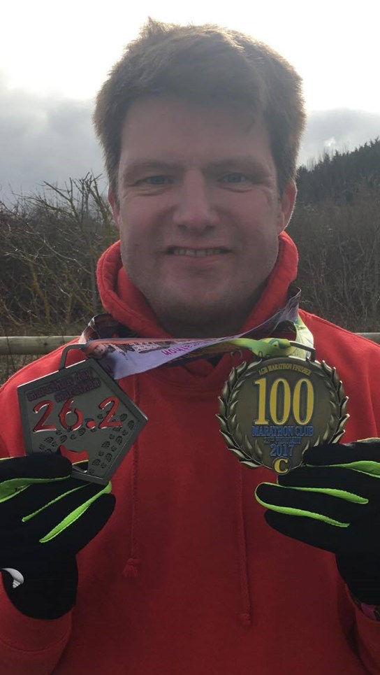 richard with his medals.jpg