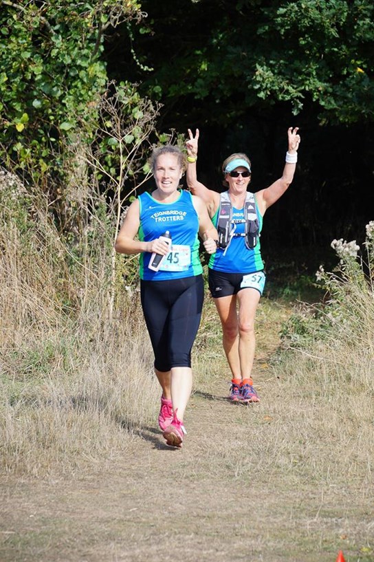 emma and sue having a caper in the woods.jpg