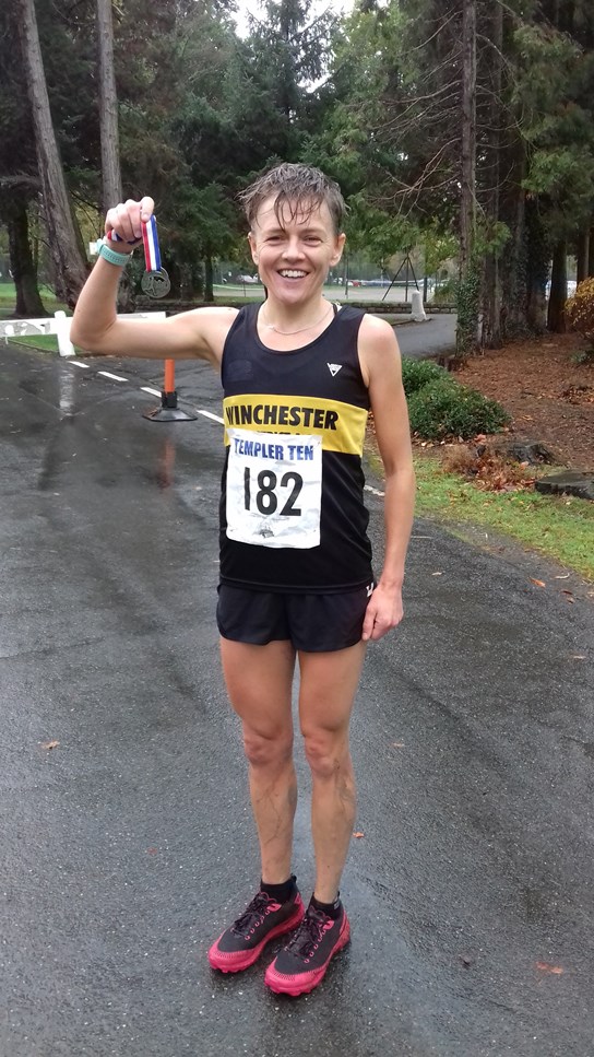 1st female finisher, joe meek.jpg