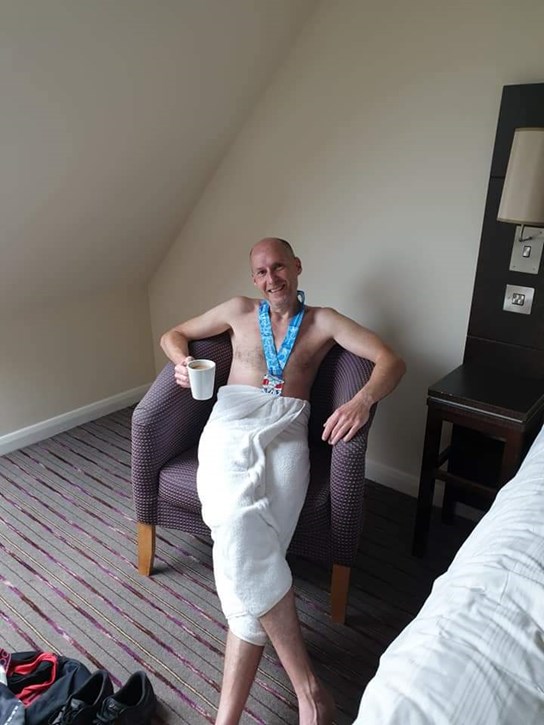 julian having a well deserved cuppa after marathon pb.jpg