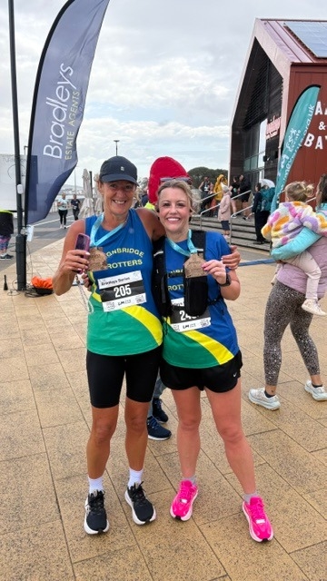 lucy_josie_exmouth 5k_medal.jpg